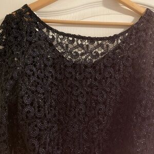 A beautiful navy blue cocktail dress with lining.